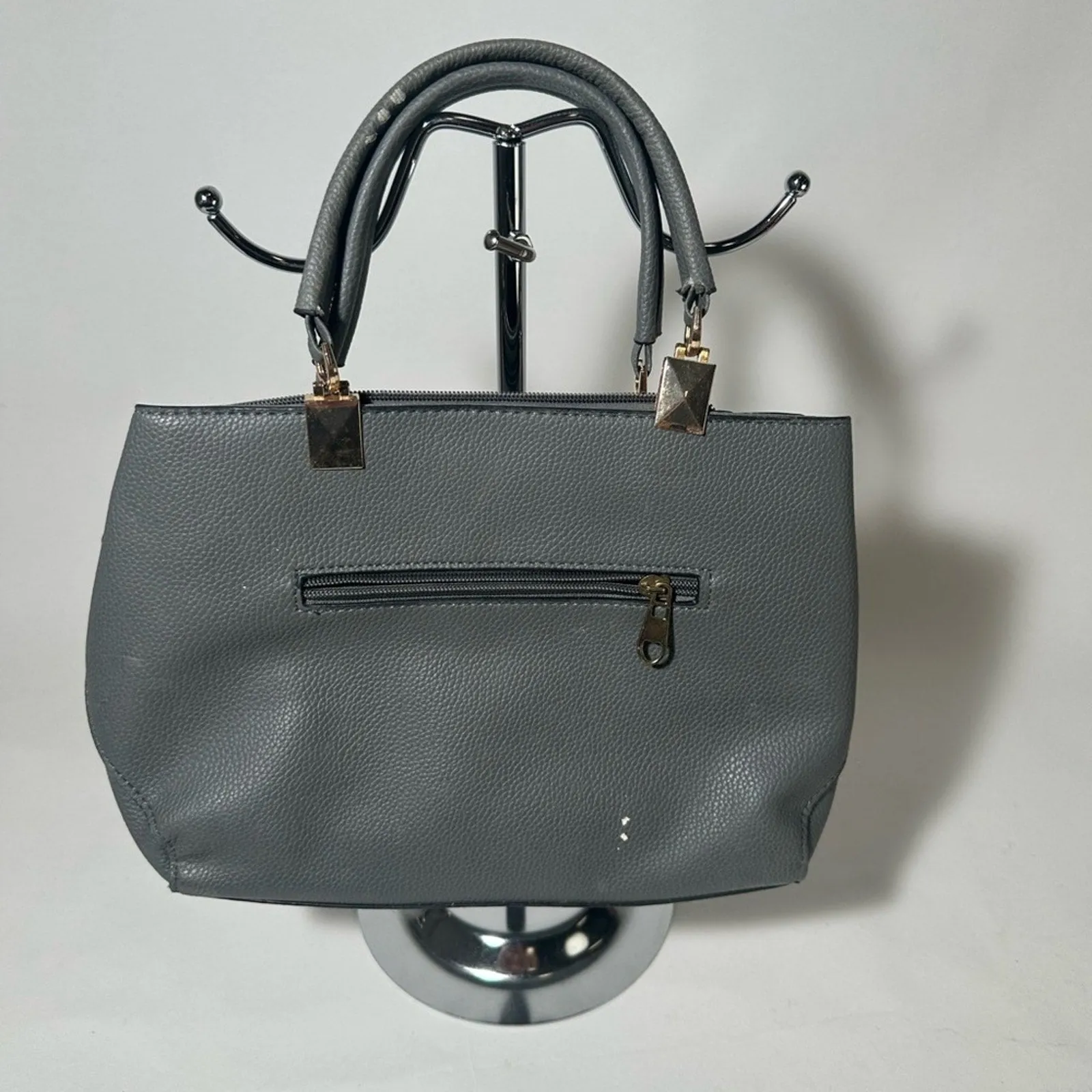 Gray Satchel with Structured Design and Gold Accents